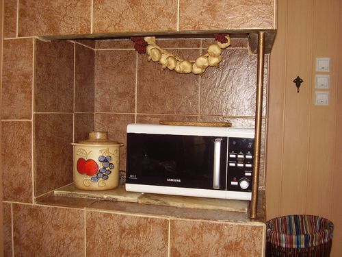 Плитка для печи (49 фото): огнеупорная и жаростойкая керамическая облицовочная плитка для каминов и печей, использование жаропрочной облицовки