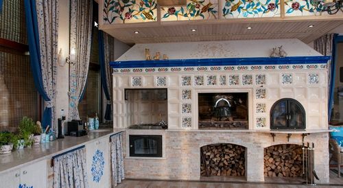 Плитка для печи (49 фото): огнеупорная и жаростойкая керамическая облицовочная плитка для каминов и печей, использование жаропрочной облицовки