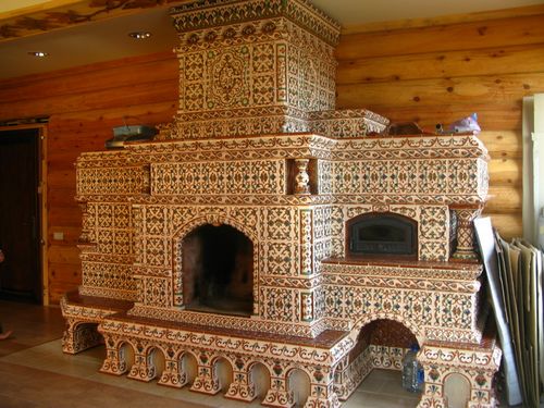 Плитка для печи (49 фото): огнеупорная и жаростойкая керамическая облицовочная плитка для каминов и печей, использование жаропрочной облицовки